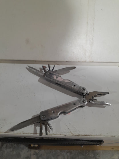 Multi-tool featuring multiple blades and tools, perfect for outdoor adventures and home repairs.