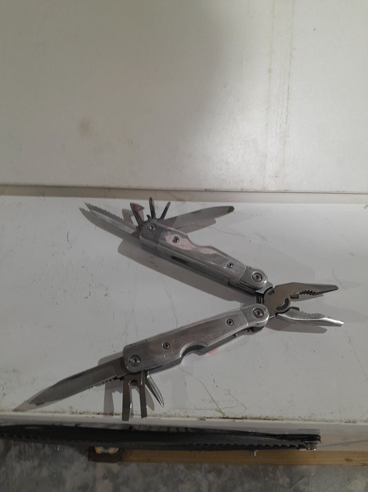 Multi-tool featuring multiple blades and tools, perfect for outdoor adventures and home repairs.