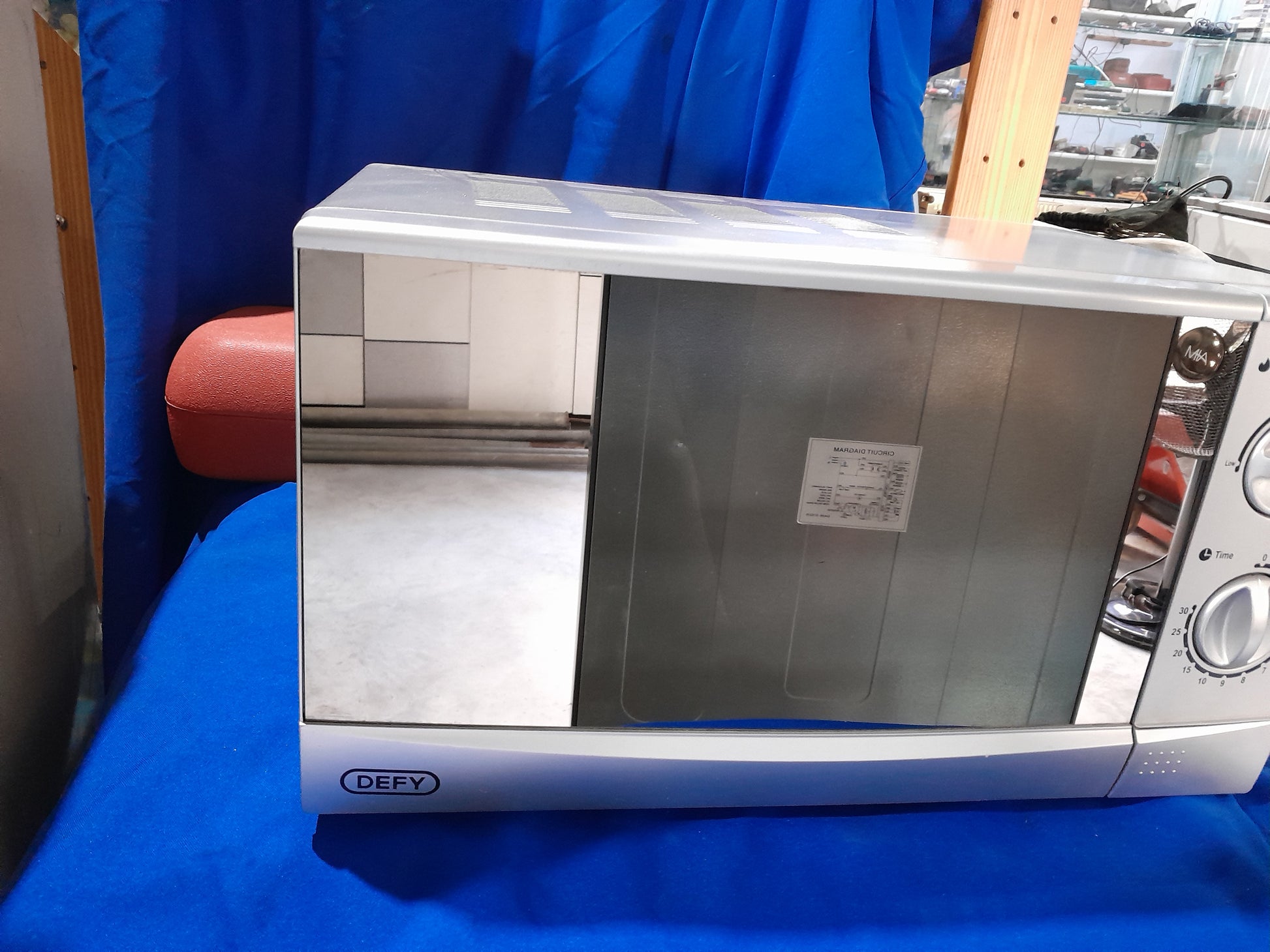  Defy 20L mirror glass door microwave in silver, model DMO 381, 700W output, compact kitchen appliance.