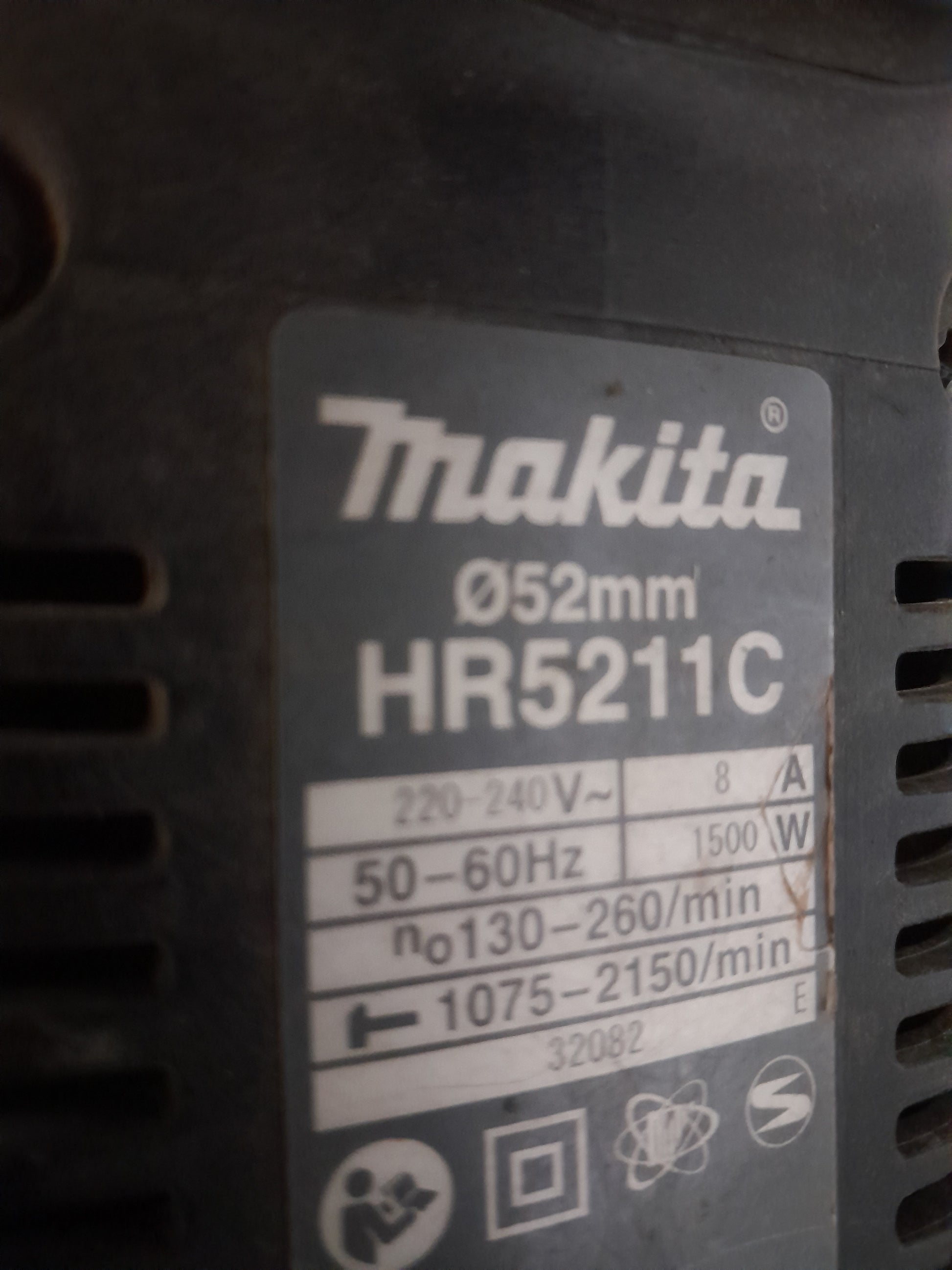 Quality used Makita HR5211C demolition hammer, designed for robust and efficient concrete demolition.