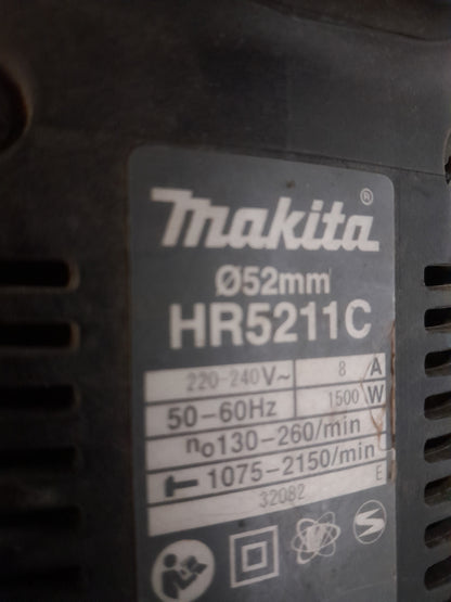 Quality used Makita HR5211C demolition hammer, designed for robust and efficient concrete demolition.