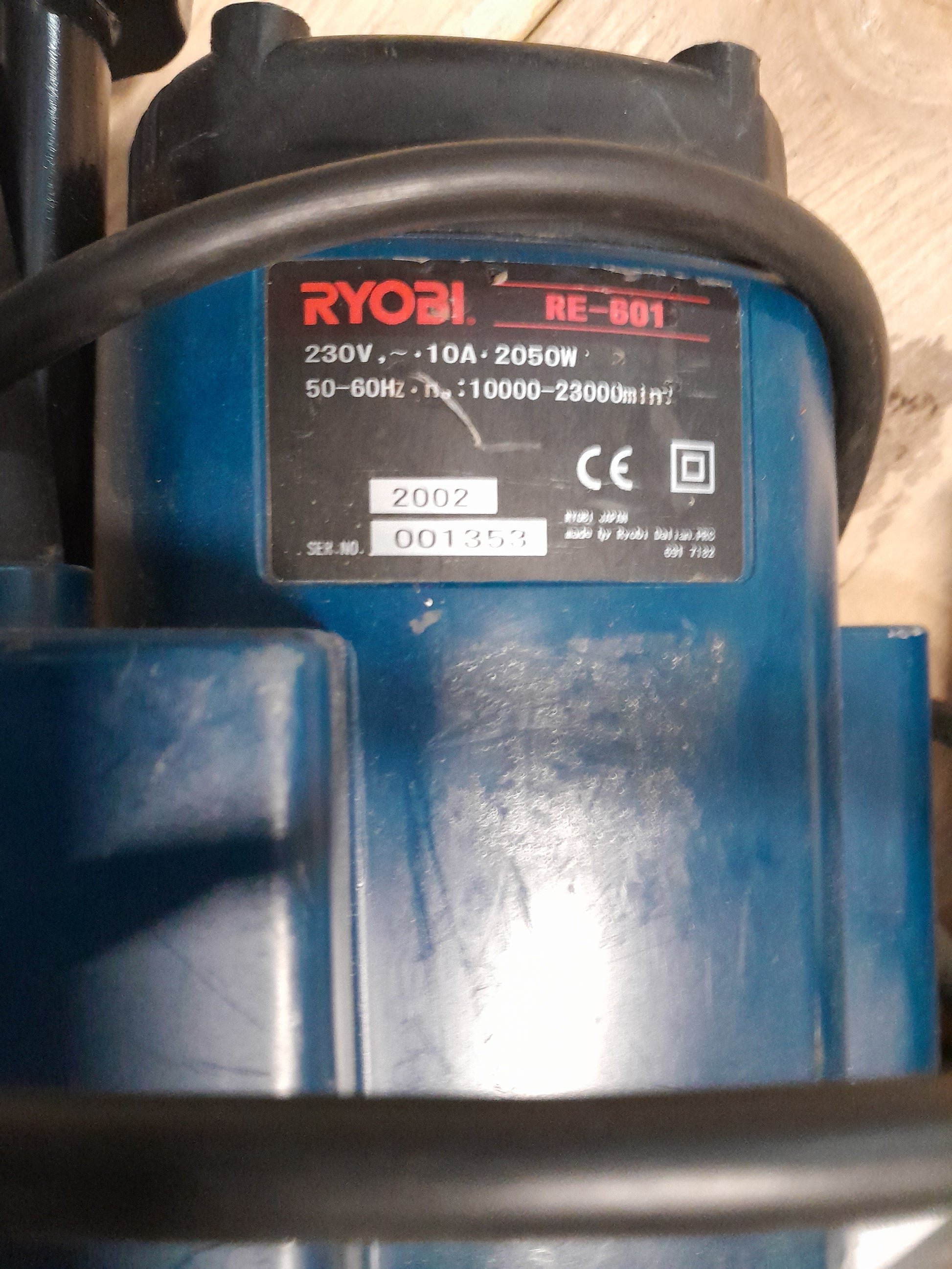 Close-up of the Ryobi Industrial Router's controls and collet size for precision work.