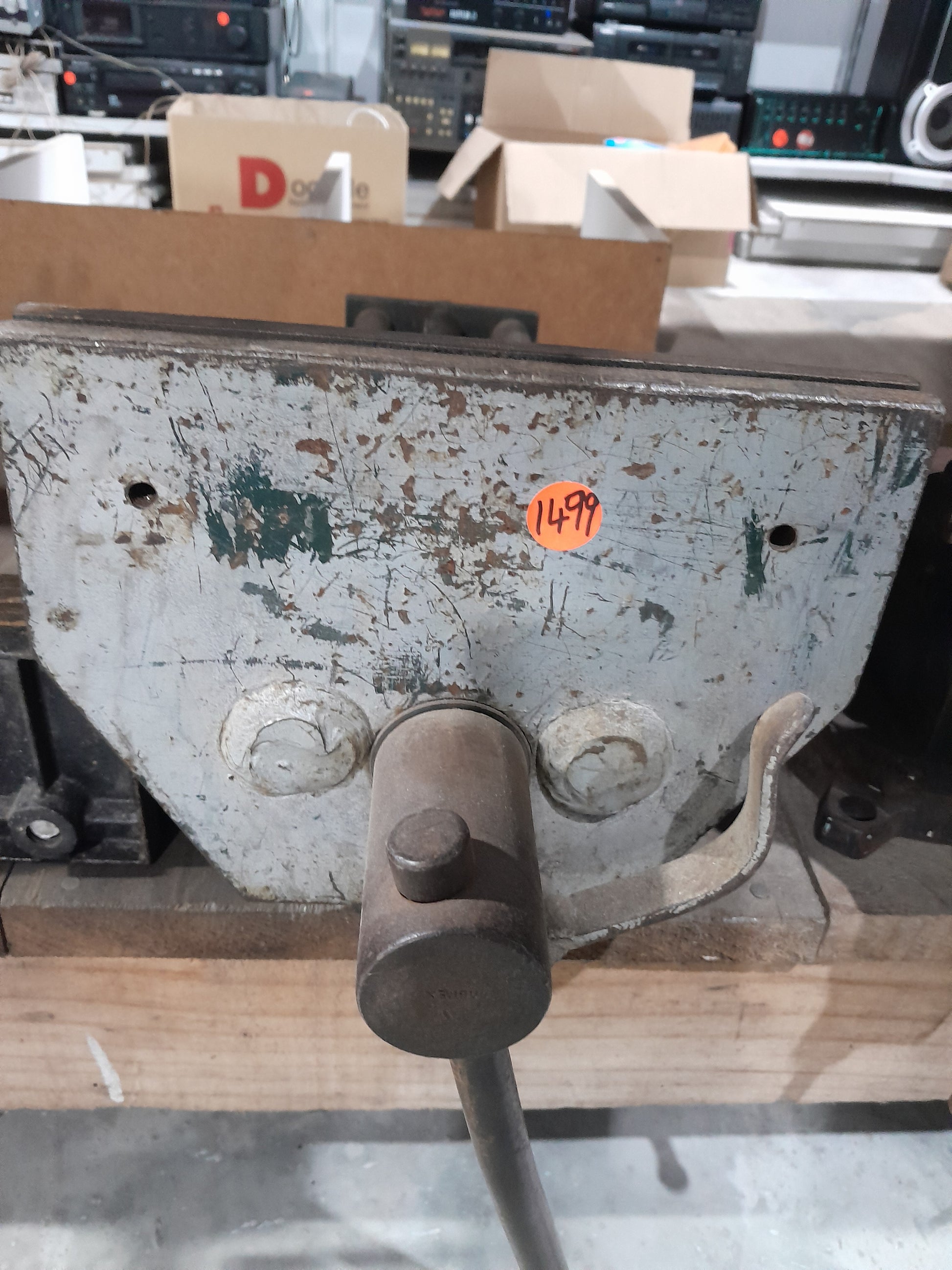 Woodworking vise mounted on a workbench, perfect for precise woodworking tasks and assembly.