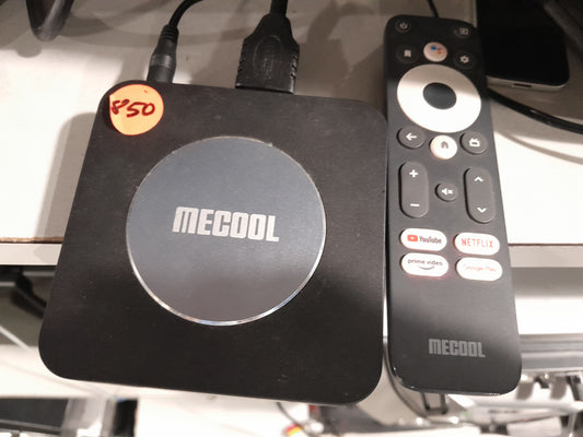 MeCool KM2 Plus 4K Android TV box with remote, perfect for streaming apps like Netflix and YouTube.
