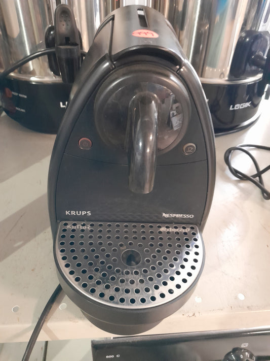 Compact Krups Nespresso coffee maker ideal for brewing espresso with capsules in seconds.