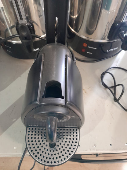 Efficient Krups espresso maker designed for capsule use, ideal for small kitchens or coffee enthusiasts.