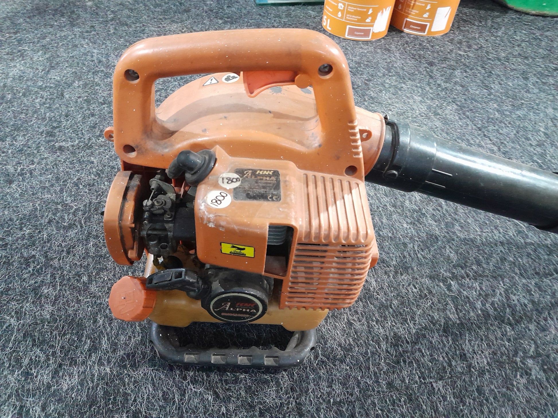 Alpha Petrol Leaf Blower, lightweight and efficient for removing garden debris effortlessly.
