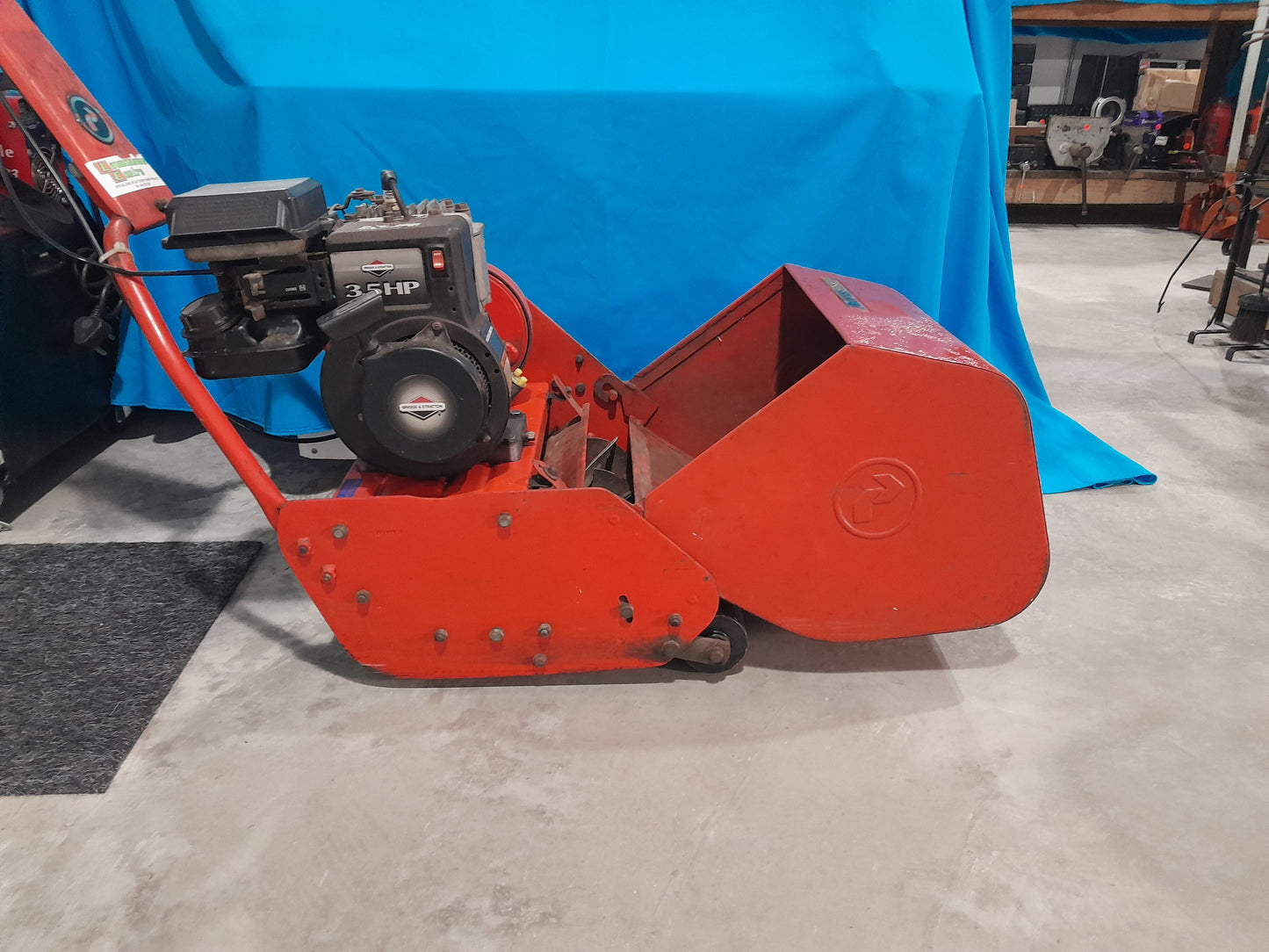 Secondhand professional lawnmower featuring a powerful Briggs and Stratton engine for robust performance.