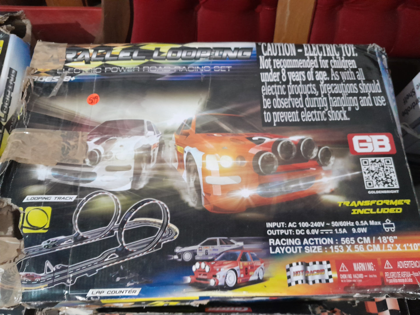 Detailed view of the Parallel Looping Electric Power Road Racing Set showing controllers and track loops.