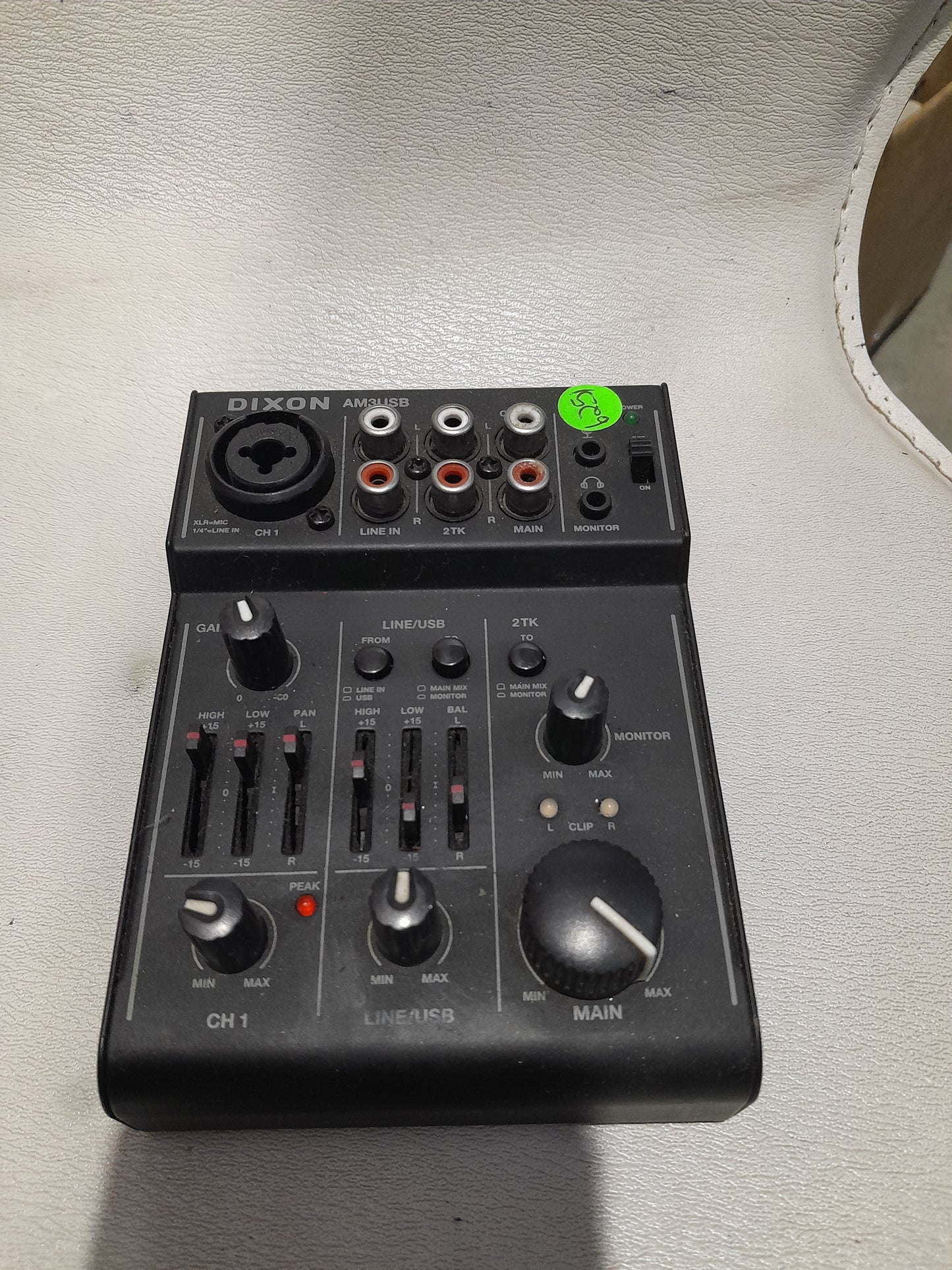 Close-up of Dixon AM3USB mixer inputs and outputs, designed for versatile audio applications.