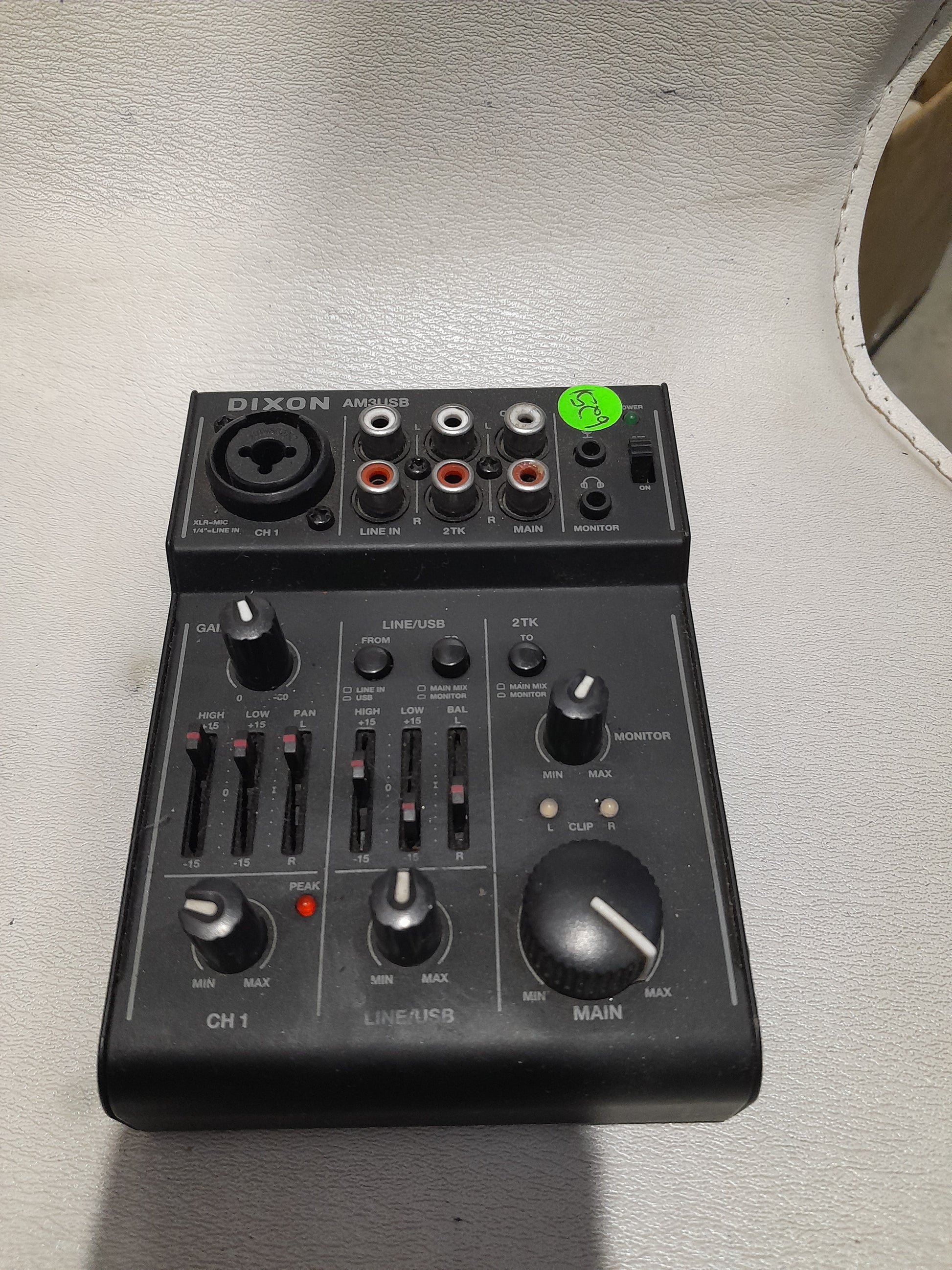 Close-up of Dixon AM3USB mixer inputs and outputs, designed for versatile audio applications.