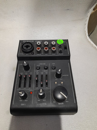 Close-up of Dixon AM3USB mixer inputs and outputs, designed for versatile audio applications.