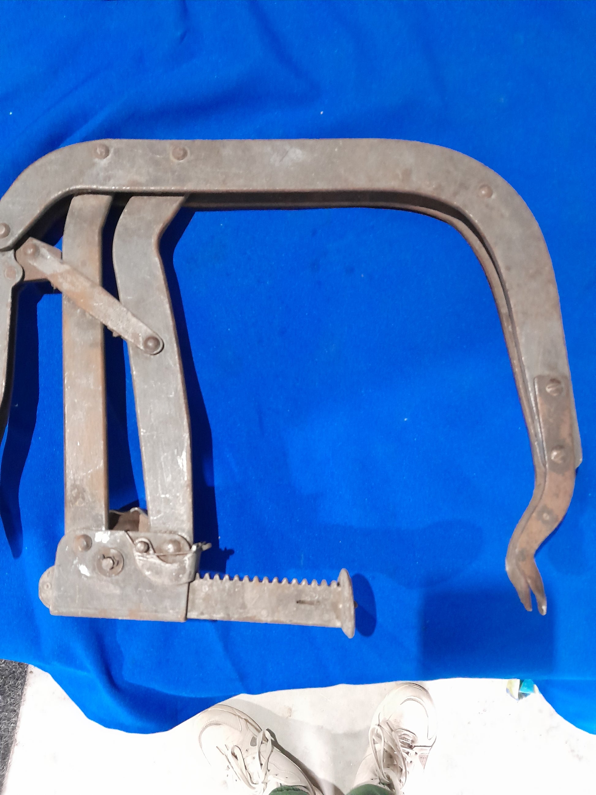 Durable valve spring compressor ideal for automotive engine repairs and maintenance tasks.