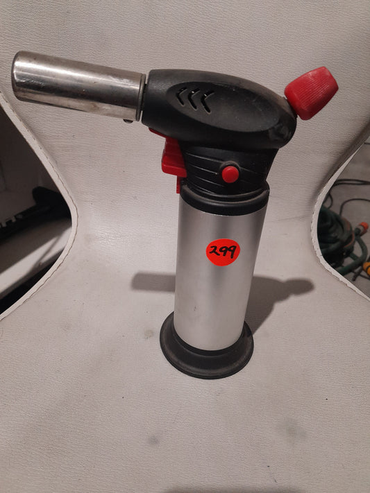 Compact butane gas torch with adjustable flame for cooking and DIY projects.