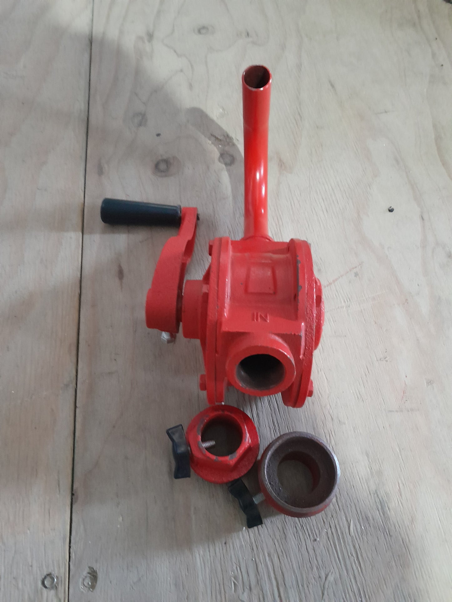 Compact Koshin rotary drum pump made of cast iron, perfect for lightweight fluid dispensing.
