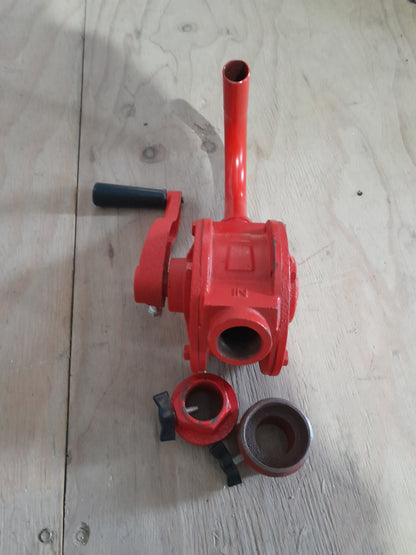 Compact Koshin rotary drum pump made of cast iron, perfect for lightweight fluid dispensing.