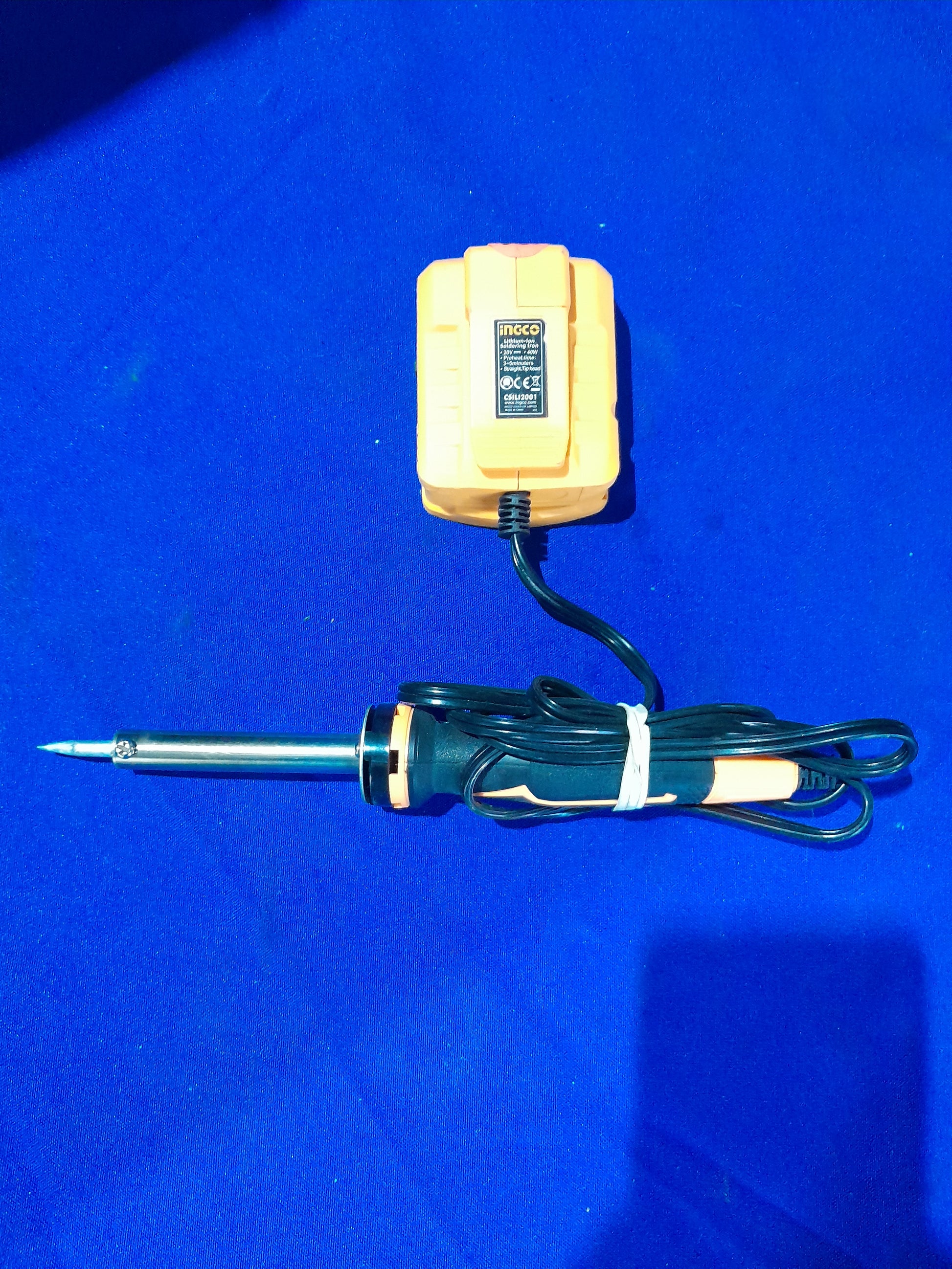 Ingco 20V battery-operated soldering iron with a straight tip, perfect for various soldering tasks.