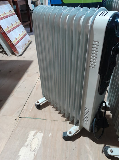 Goldair 11Fin Slim Oil Heater, portable room heater with wheels, ideal for quick heating.